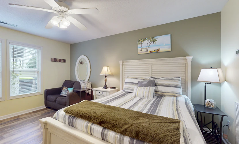 Coastal Condo with golf course view and shared pool access