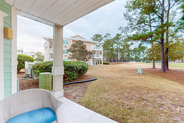 Coastal Condo with golf on-site, shared pool and fitness center