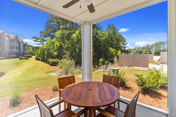 Centrally located condo with a patio, W/D, & AC - pool and on-site golf access