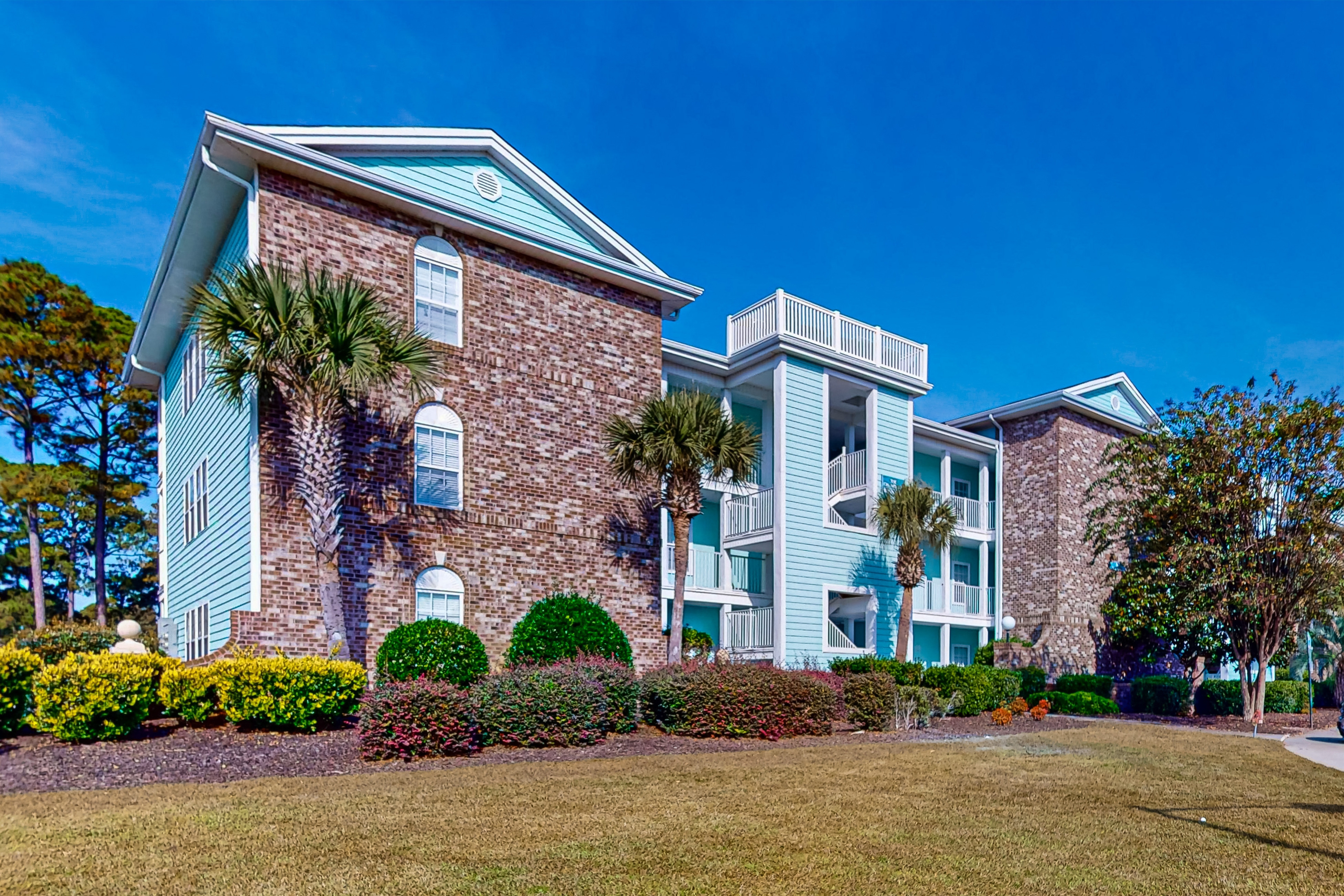 Coastal Suite with golf course view and shared pool access