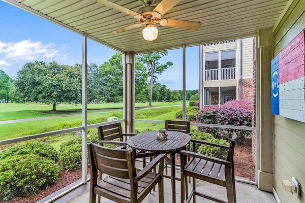 Golf-course-front villa at Crow Creek with screened porch and washer/dryer