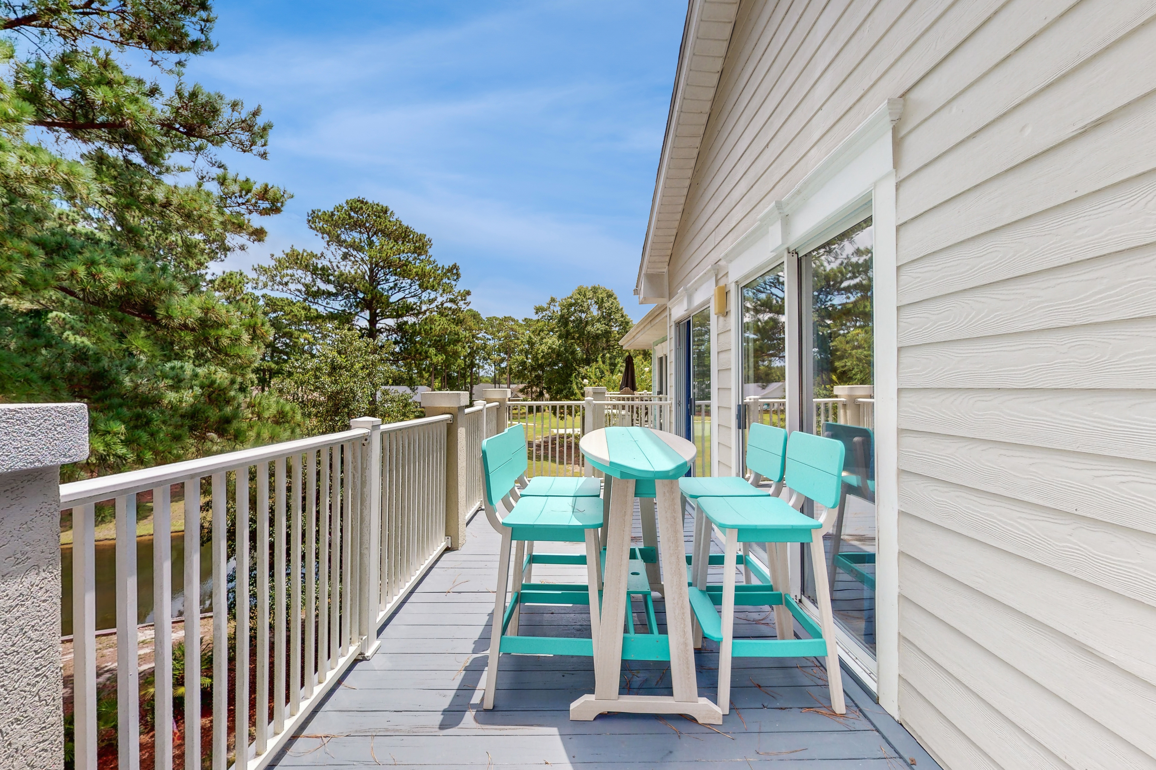 3rd-floor golf course-front condo with inviting deck, beaches & golf nearby