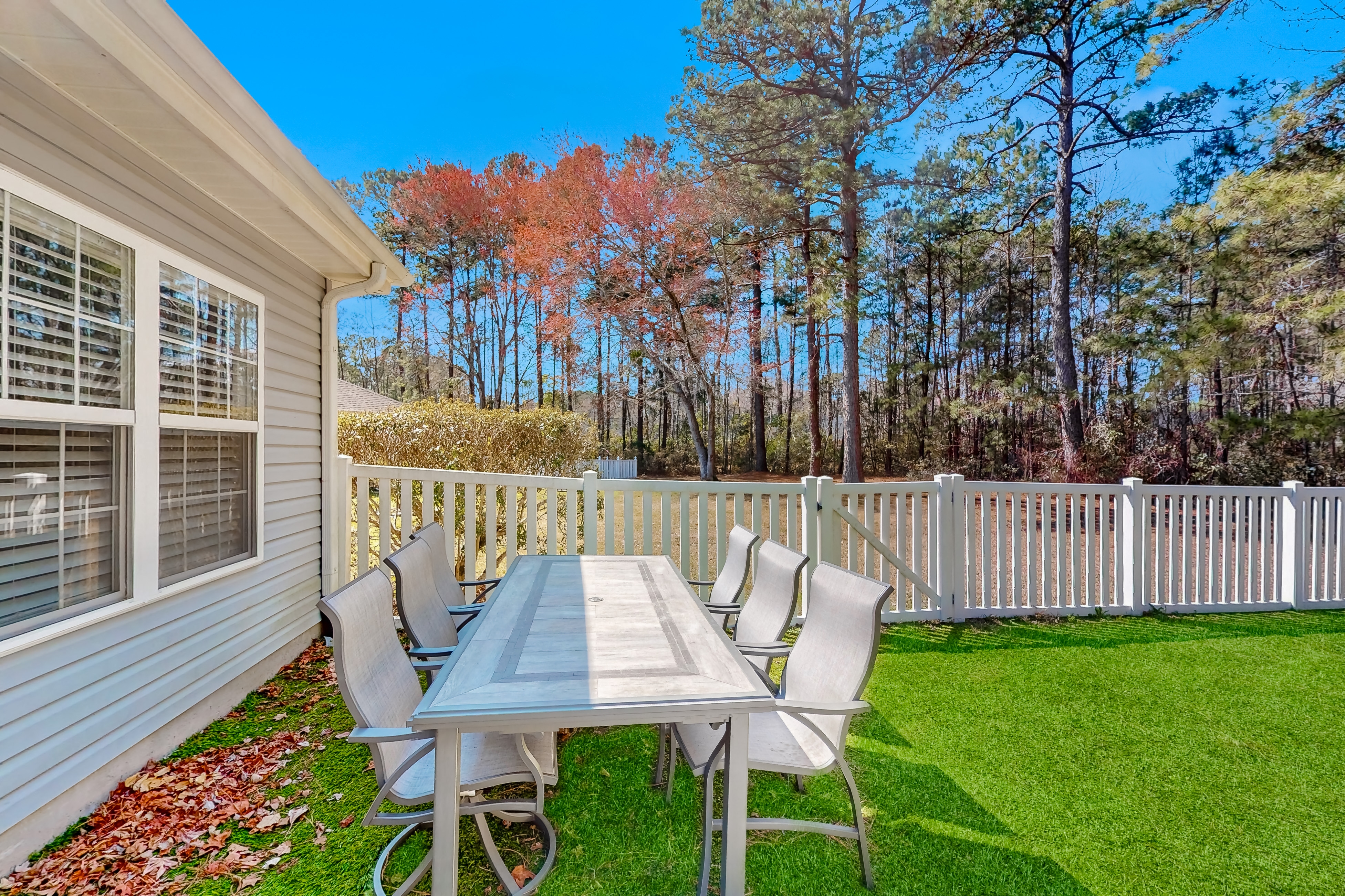 Dog-friendly coastal home with lovely patio, pool, & games - near beaches & golf
