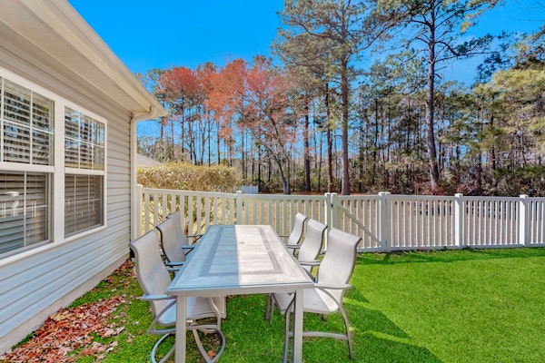 Dog-friendly coastal home with lovely patio, pool, & games - near beaches & golf