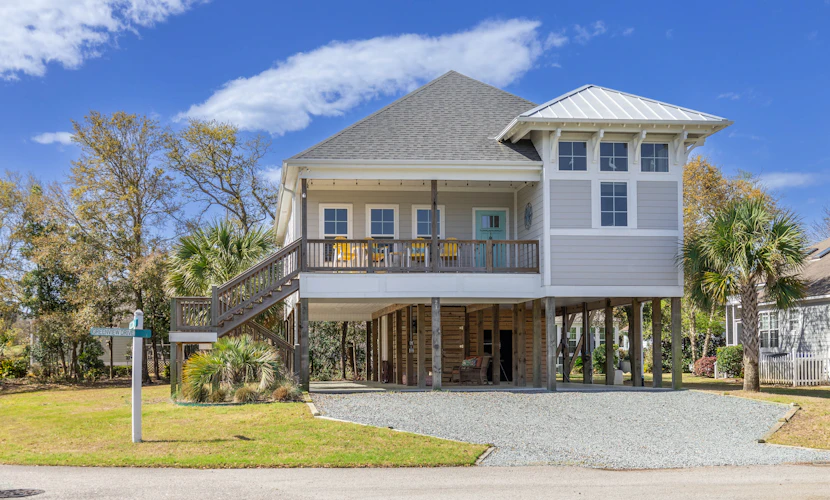 Slowin' Dune | Lavish Island Getaway with Golf Cart Near Beach, Golf, & Dining