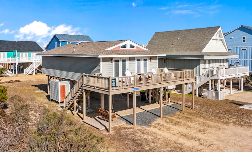 Large and roomy house across from the beach with WiFi, W/D, central AC, and deck