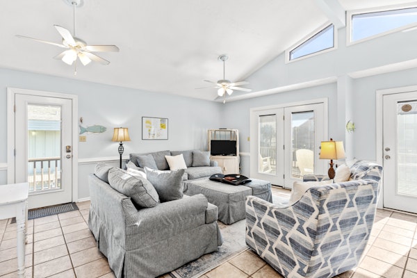 Large and roomy house across from the beach with WiFi, W/D, central AC, and deck