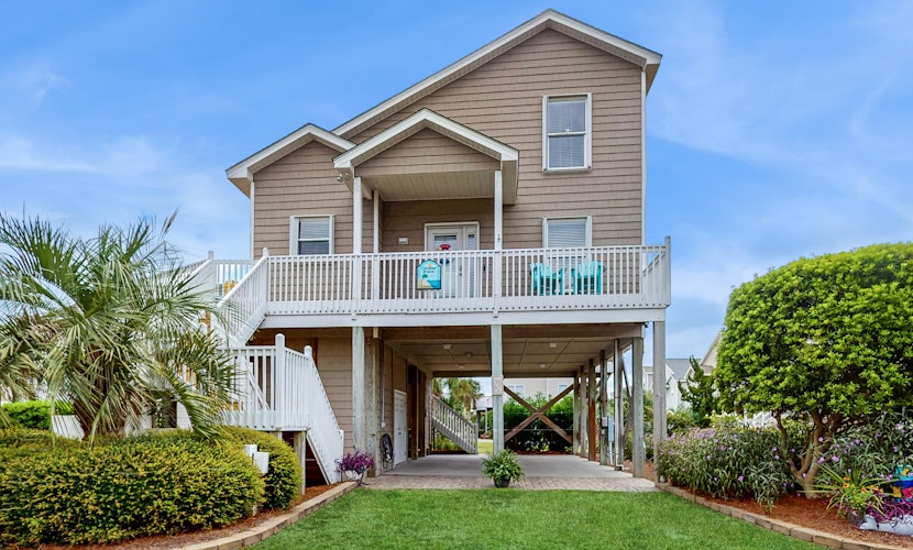 Stunning coastal home with shared oceanfront pool close to beach access
