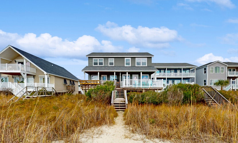 Oceanfront oasis on the beach with boardwalk, deck, outdoor shower, & central AC