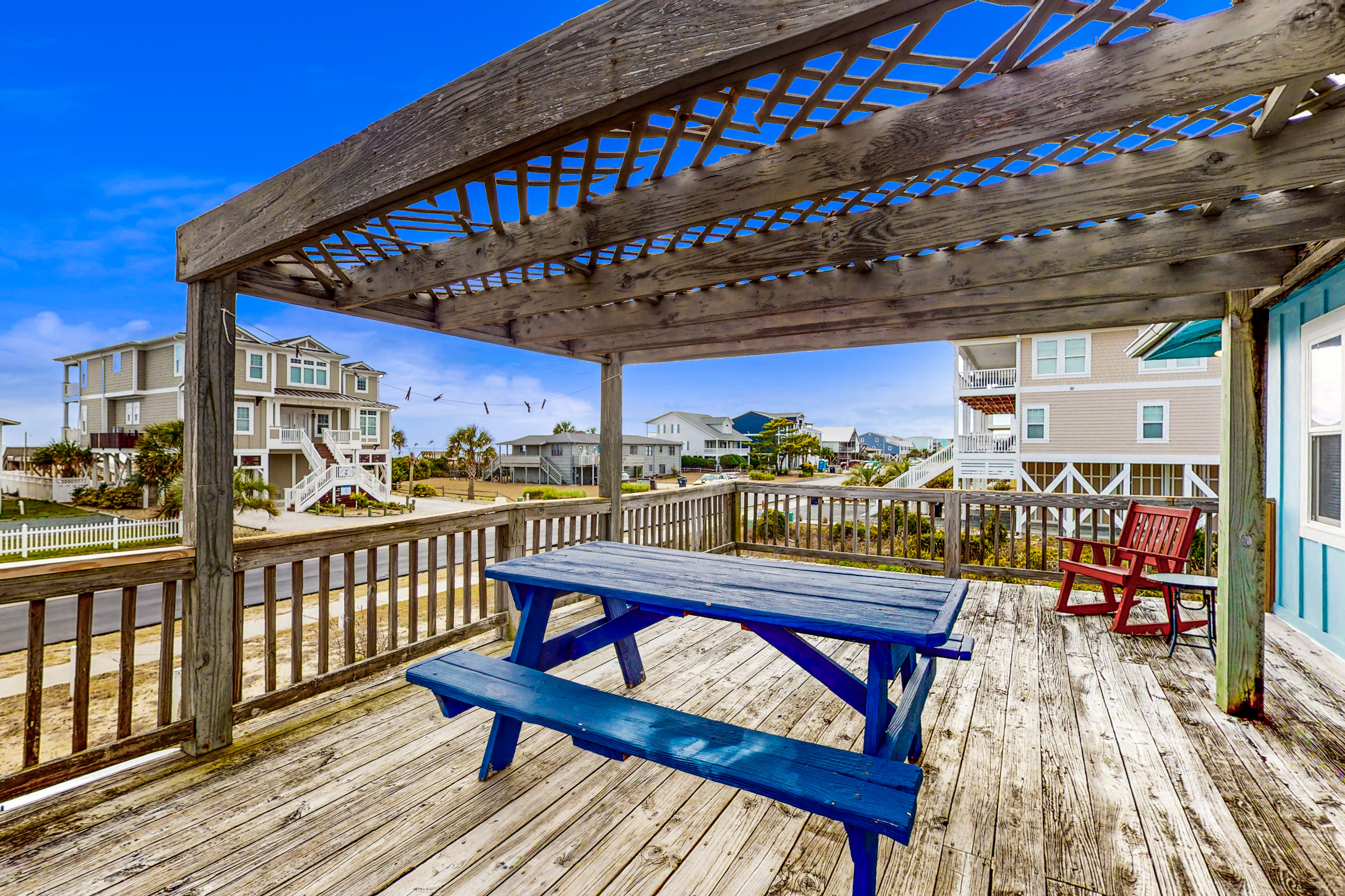 Breezy cottage across from beach access with central AC, enclosed yard & deck