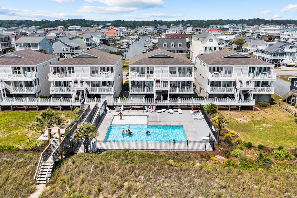 Lower Waterfront Condo with Oceanfront Balcony, Shared Outdoor Pool, WiFi & AC