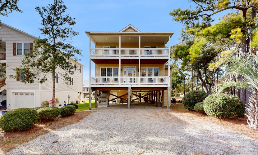 Serene island escape with two balconies & spacious layout - walk to beach