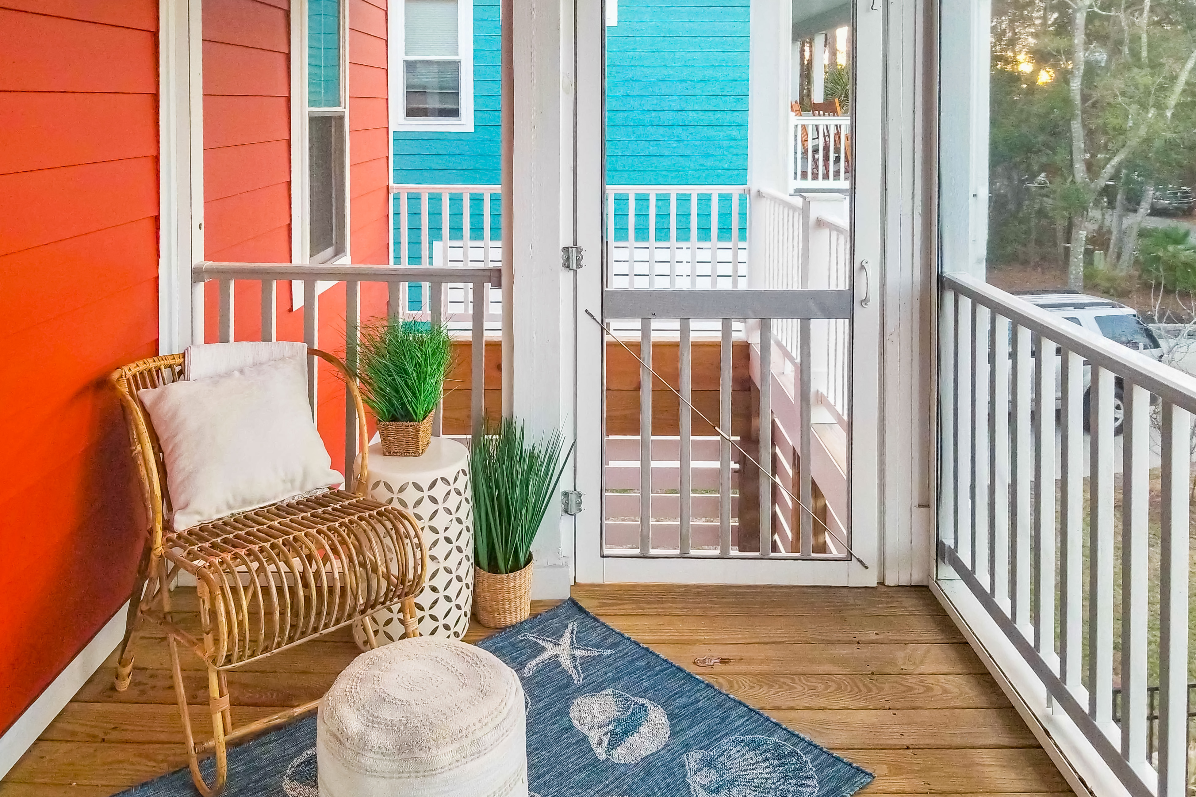 Vibrant beach-themed stay with balconies, enclosed yard, extra kitchenette, & AC