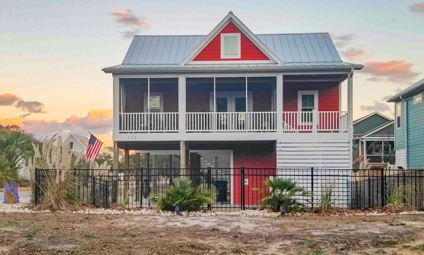 Vibrant beach-themed stay with balconies, enclosed yard, extra kitchenette, & AC