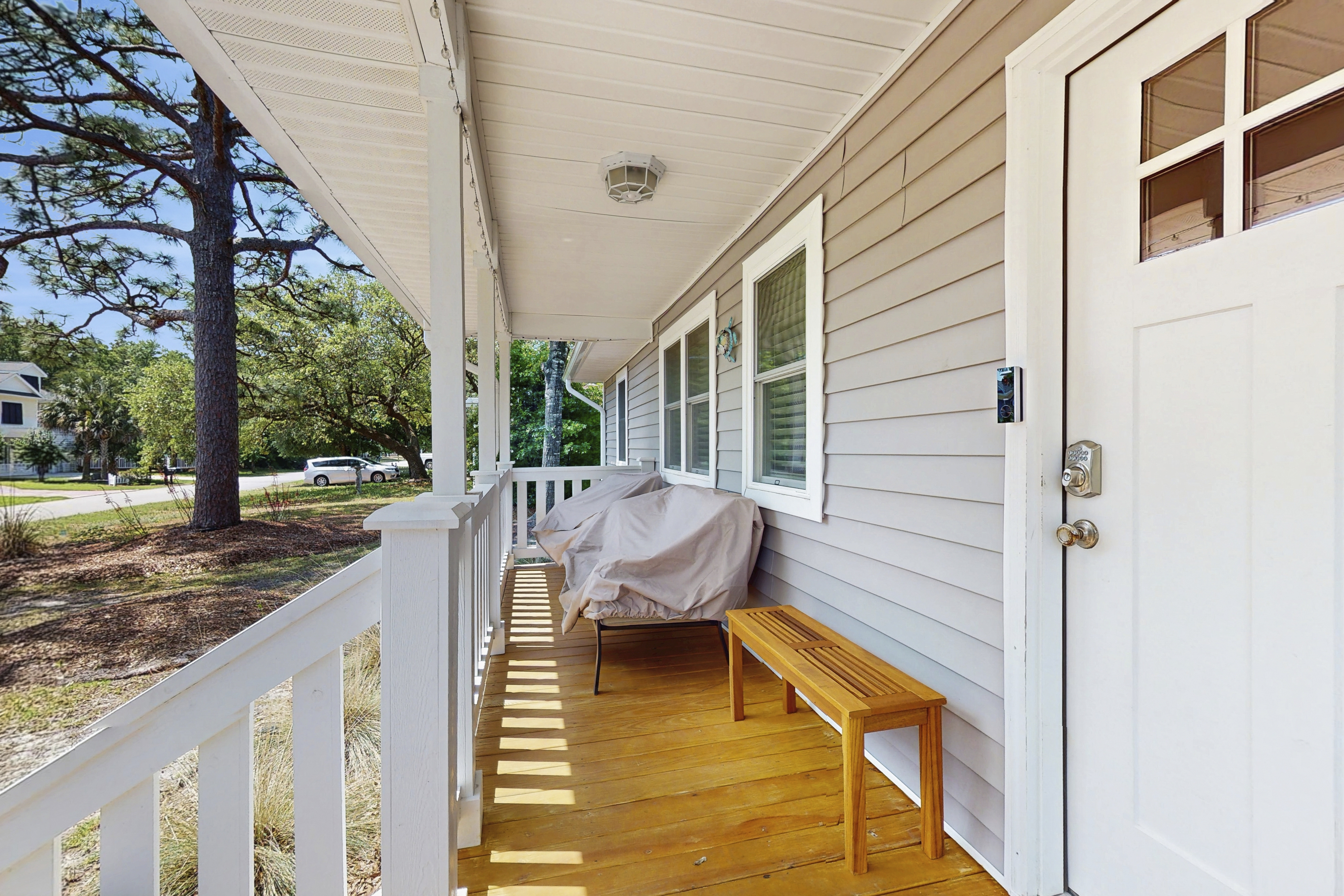 Serene home near the beach with enclosed yard, firepit, grill, bikes, AC, & W/D