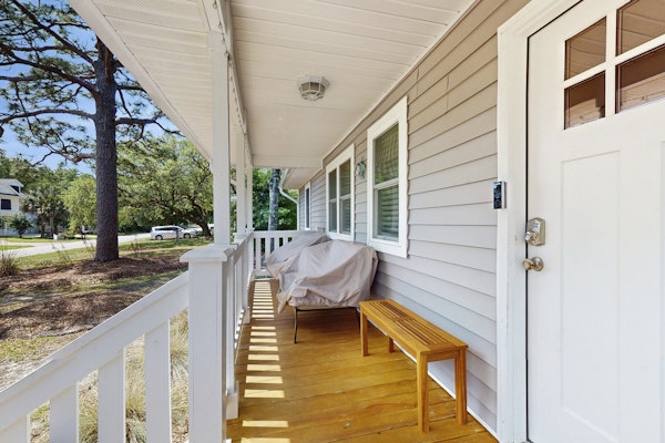 Serene home near the beach with enclosed yard, firepit, grill, bikes, AC, & W/D