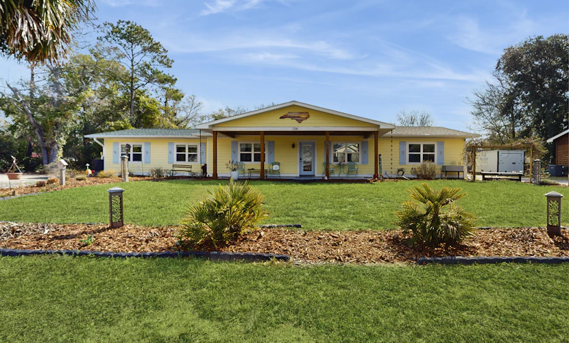 Coastal home with private pool and slide, close to beach and local attractions