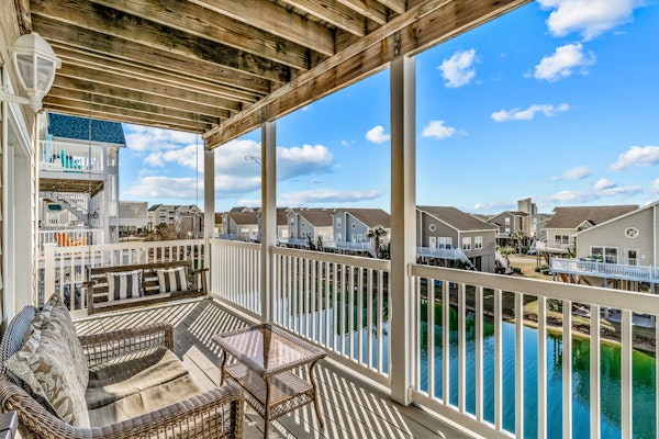 Canal-view condo with WiFi, washer/dryer, tennis, pool, & beach access