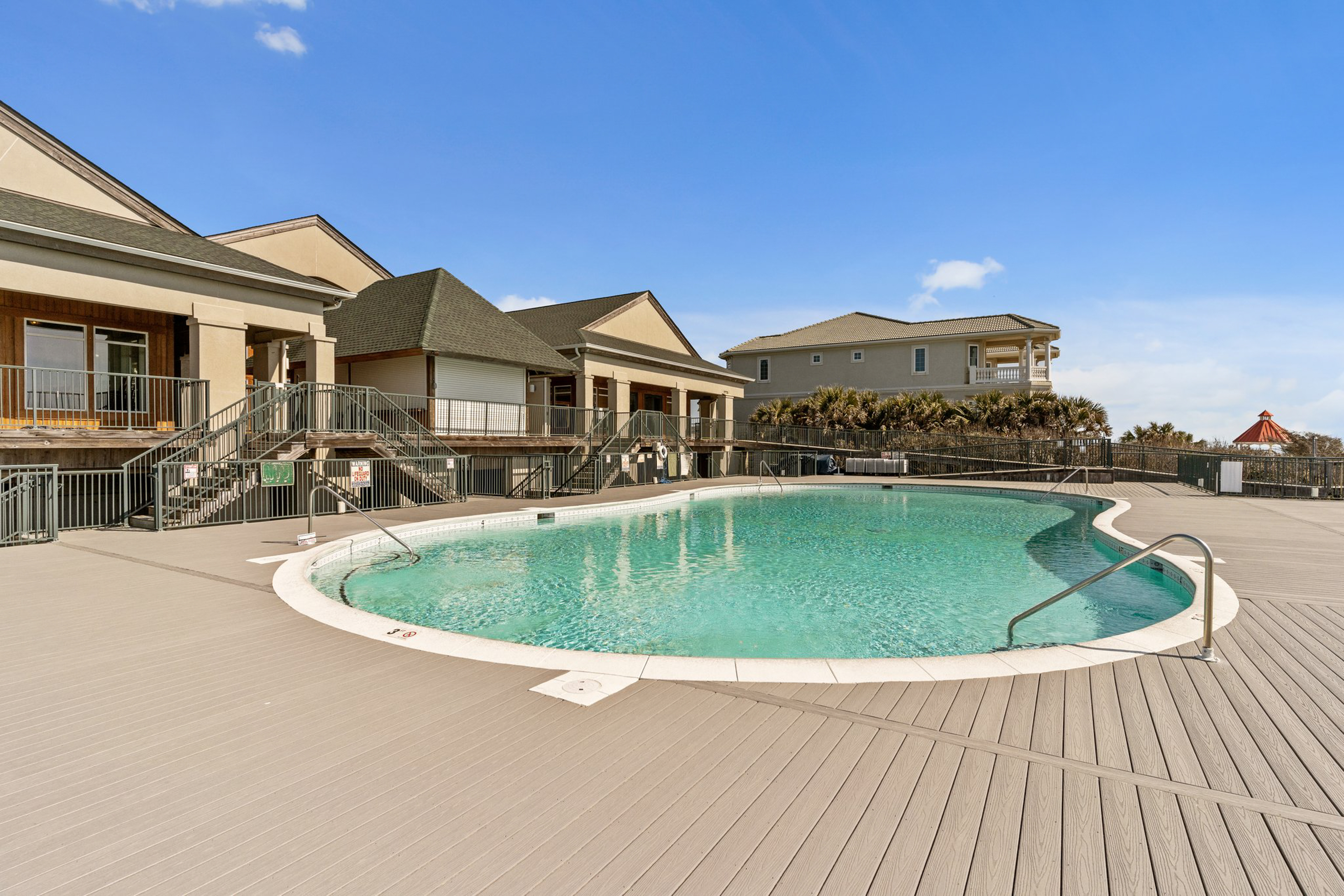 Canal-view condo with WiFi, washer/dryer, tennis, pool, & beach access