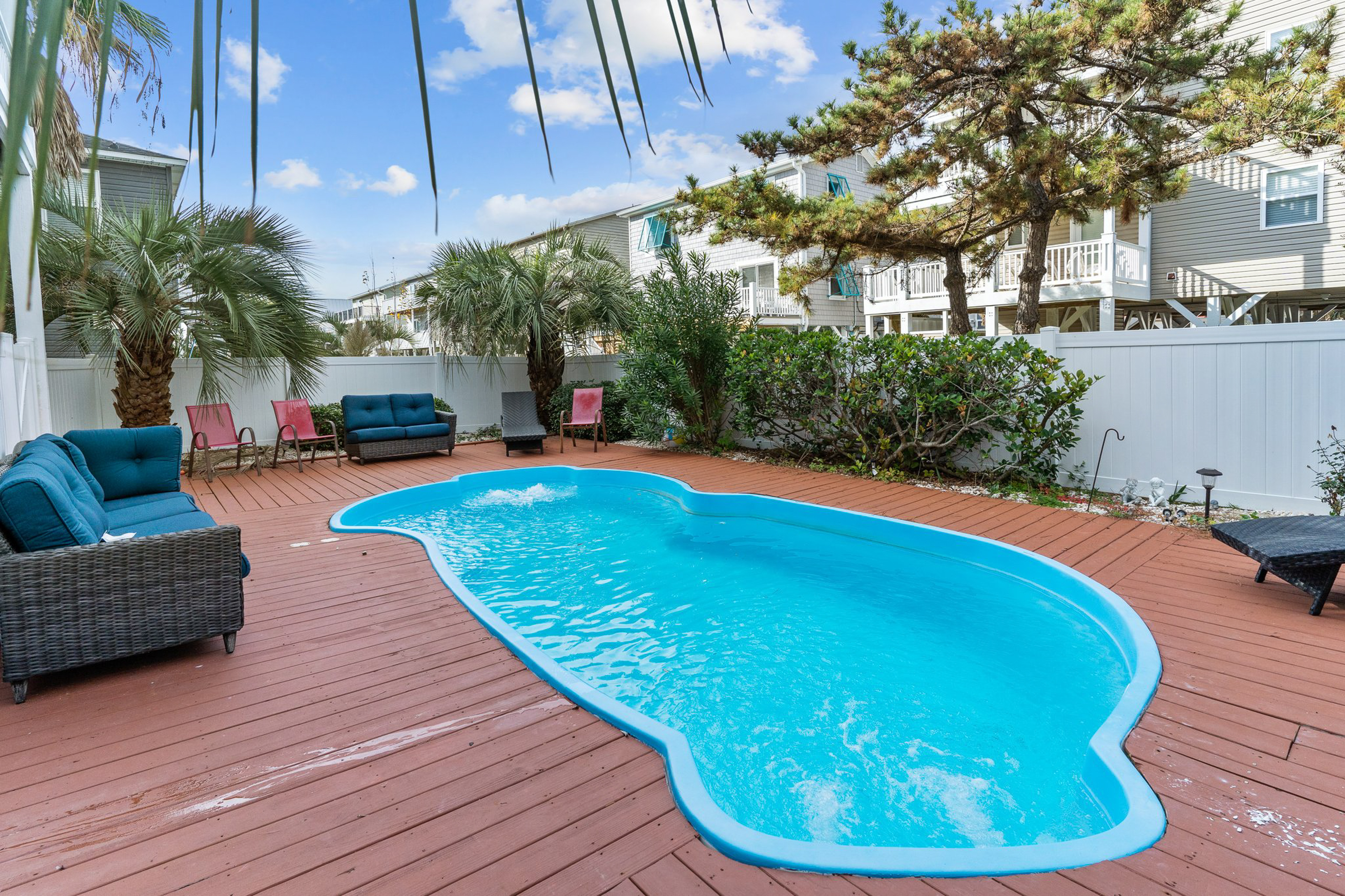 Three-story home with decks, private pool - walk to the beach