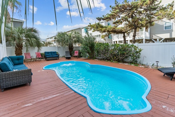 Three-story home with decks, private pool - walk to the beach