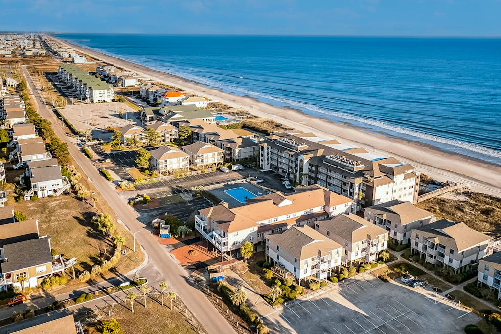 Beach Bliss | Beach-view condo near beach with balcony, outdoor pool, W/D, AC