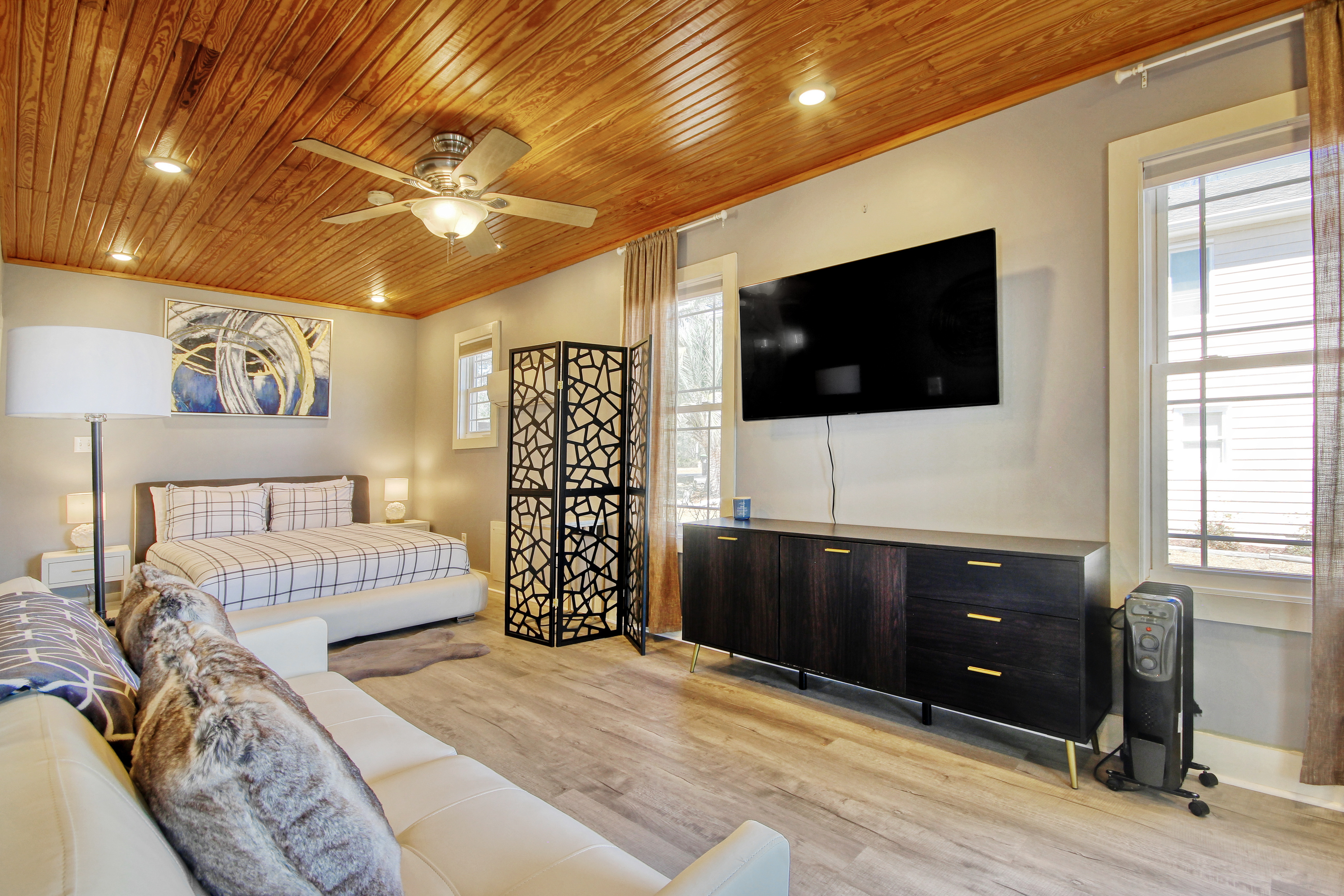 Unique riverfront home with two suites, high-speed WiFi, & private dock