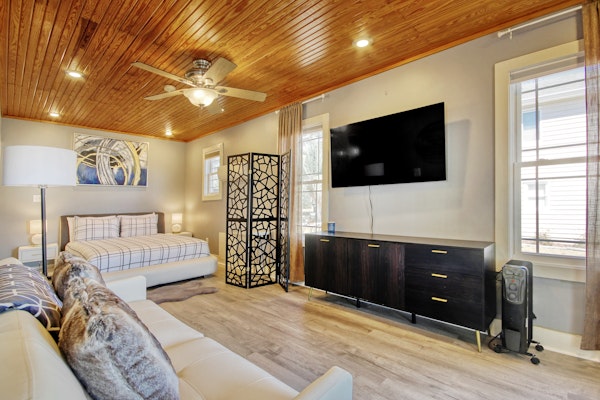 Unique riverfront home with two suites, high-speed WiFi, & private dock