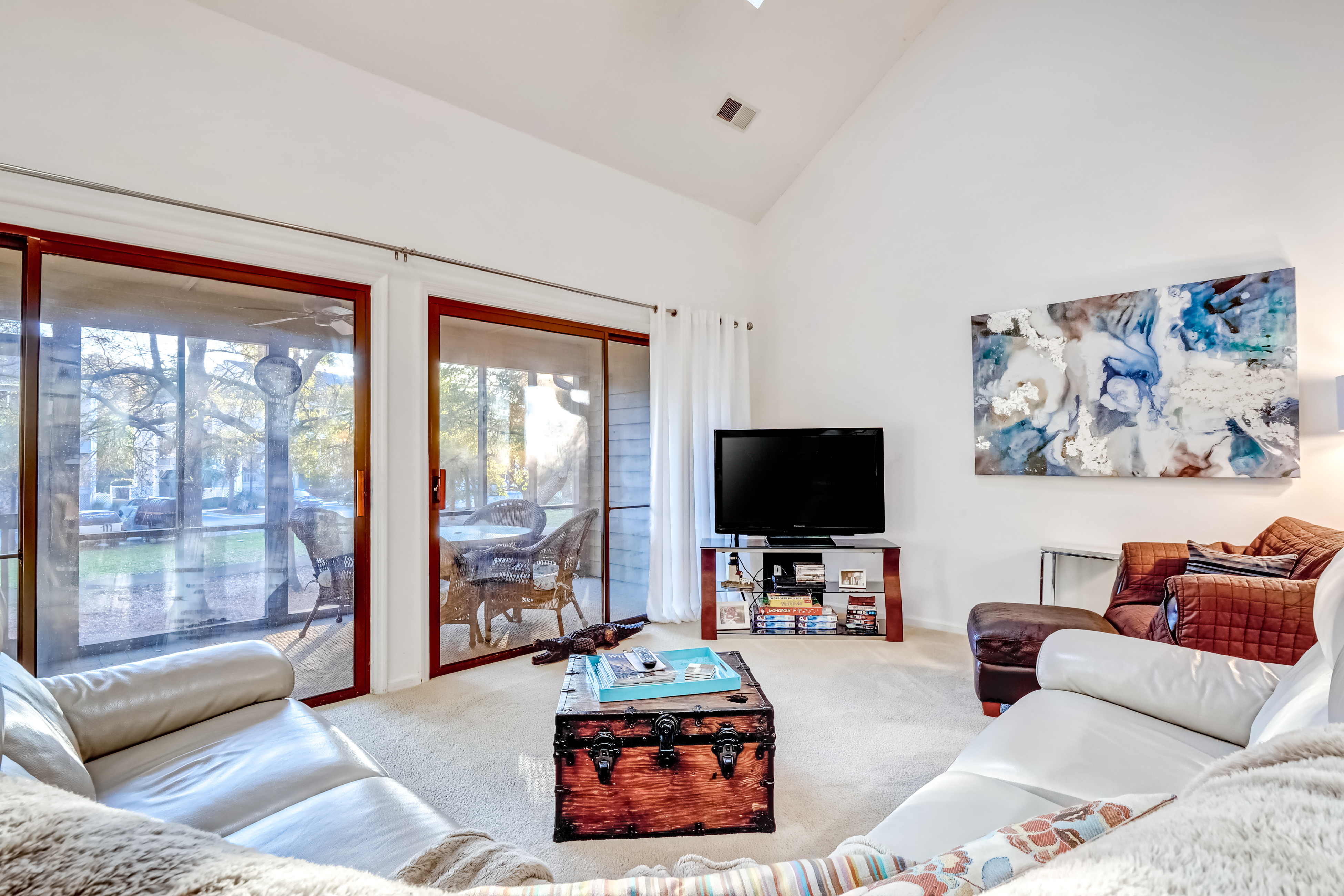 Spacious townhome in perfect location with screened patio, central AC, & WiFi