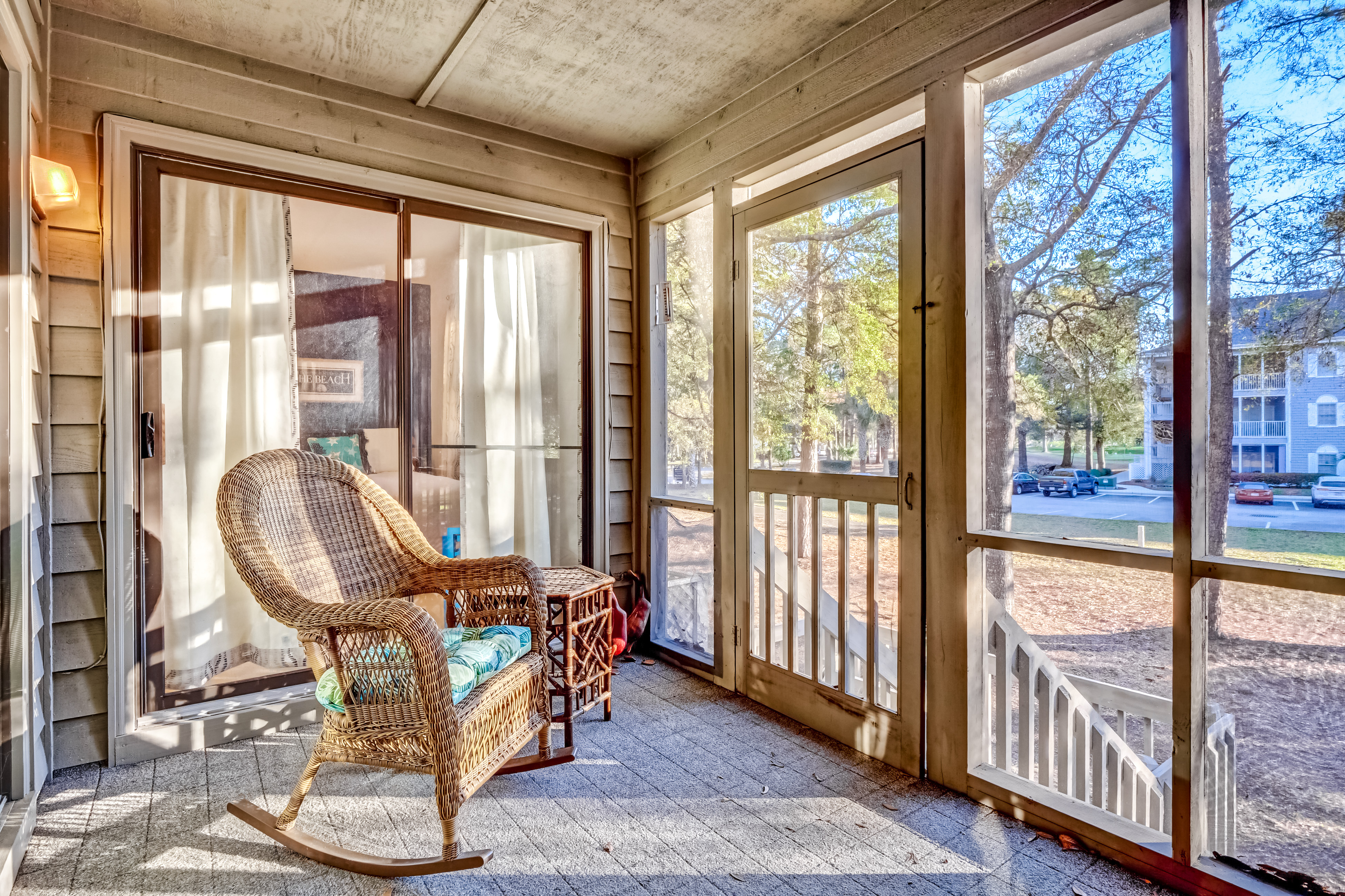 Spacious townhome in perfect location with screened patio, central AC, & WiFi