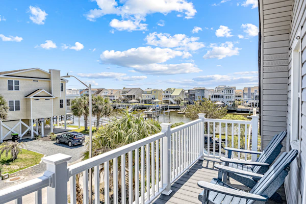 Home near the beach with balconies, outdoor shower, grill, beach gear, W/D, & AC