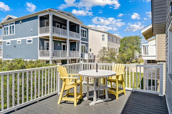 Home near the beach with balconies, outdoor shower, grill, beach gear, W/D, & AC