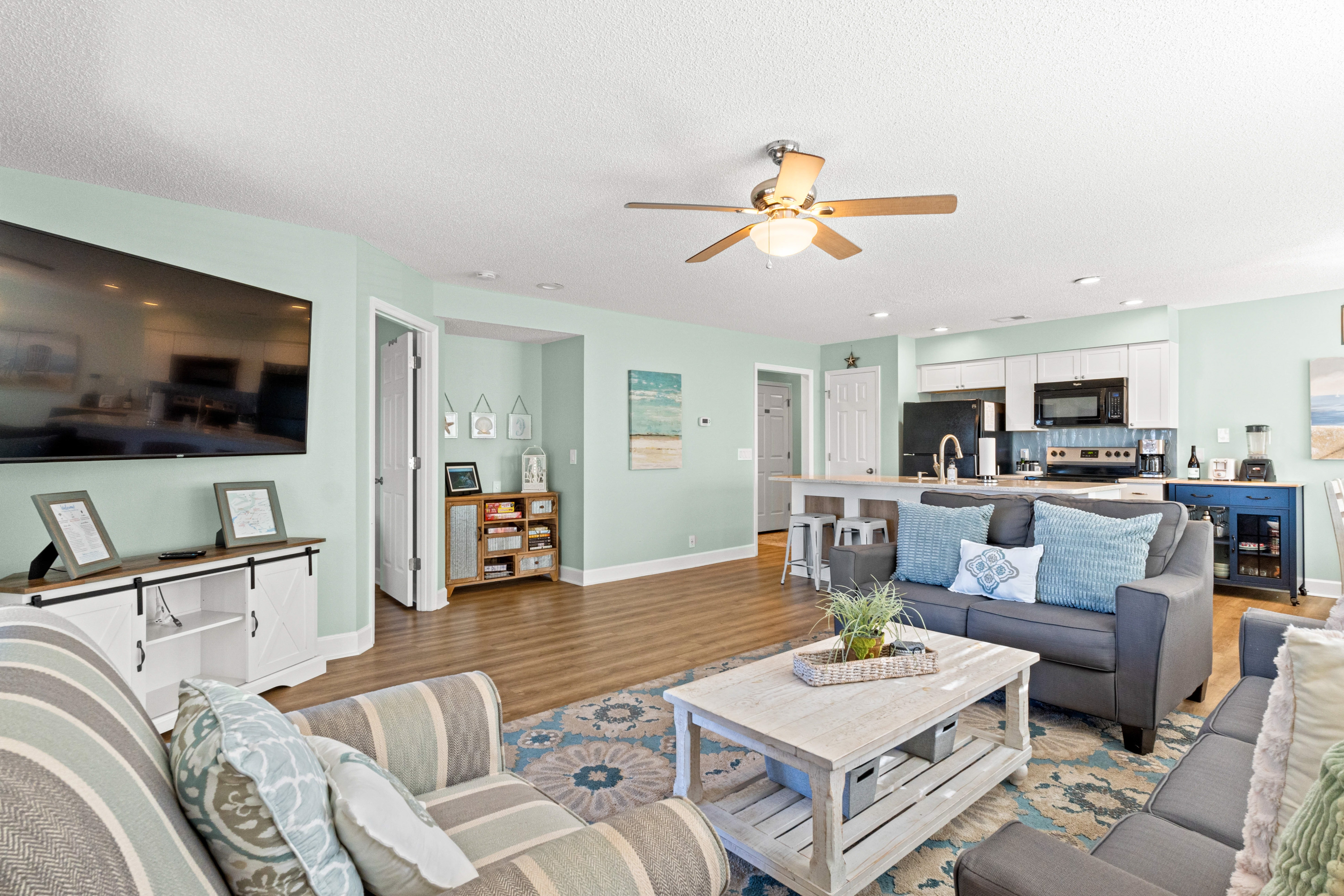 Beachside resort condo with screened balconies & golf