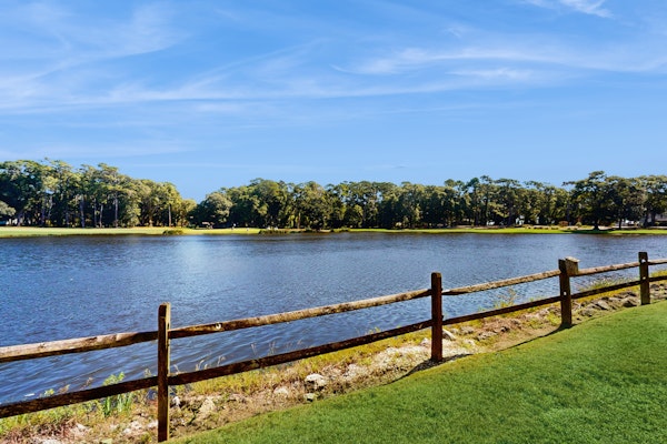 Lakefront condo with patio, AC, & water views plus pool & tennis