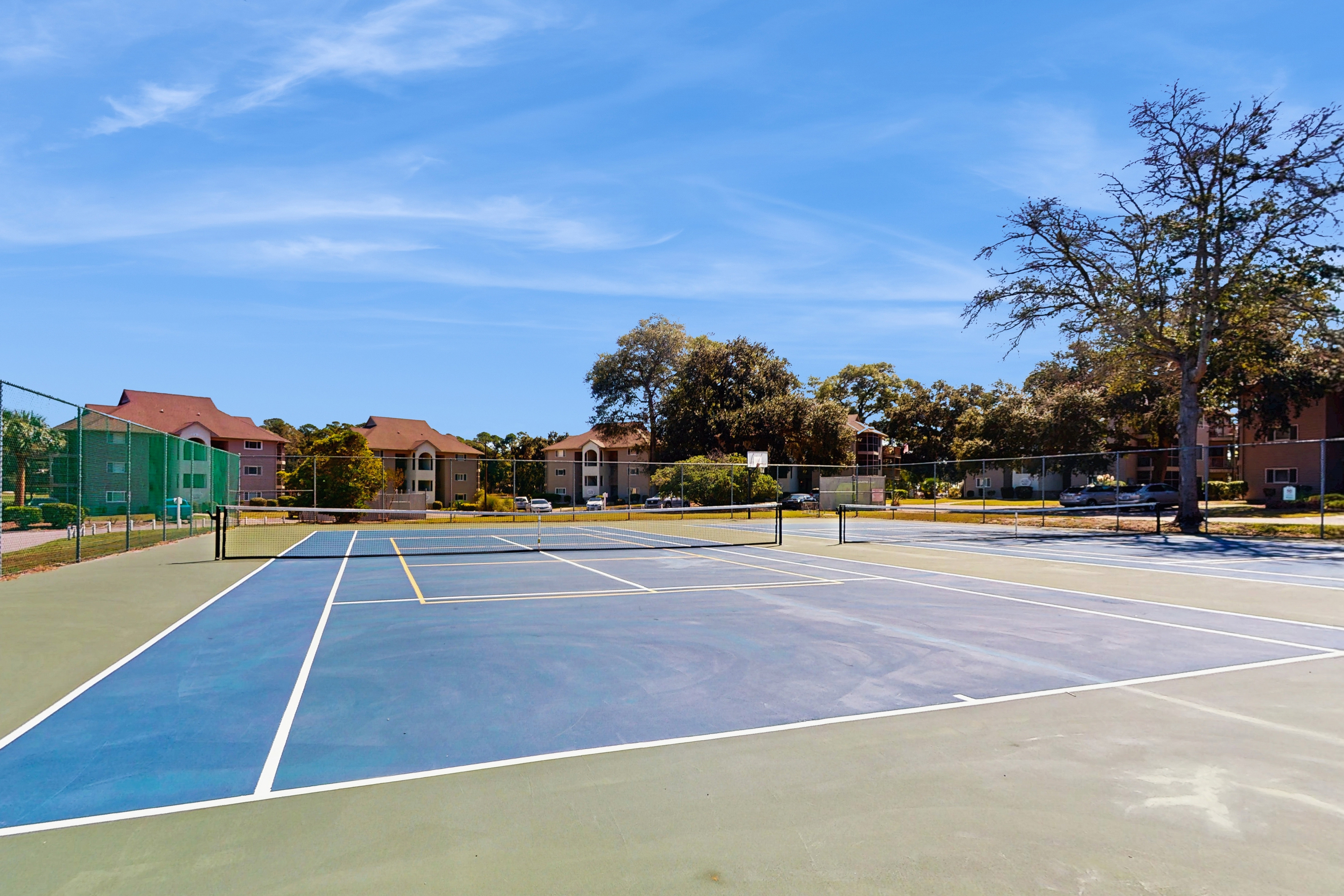 Lakefront condo with patio, AC, & water views plus pool & tennis