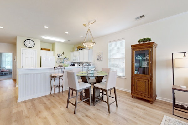 Dog-friendly water view condo with AC & access to pools, tennis, & hot tub