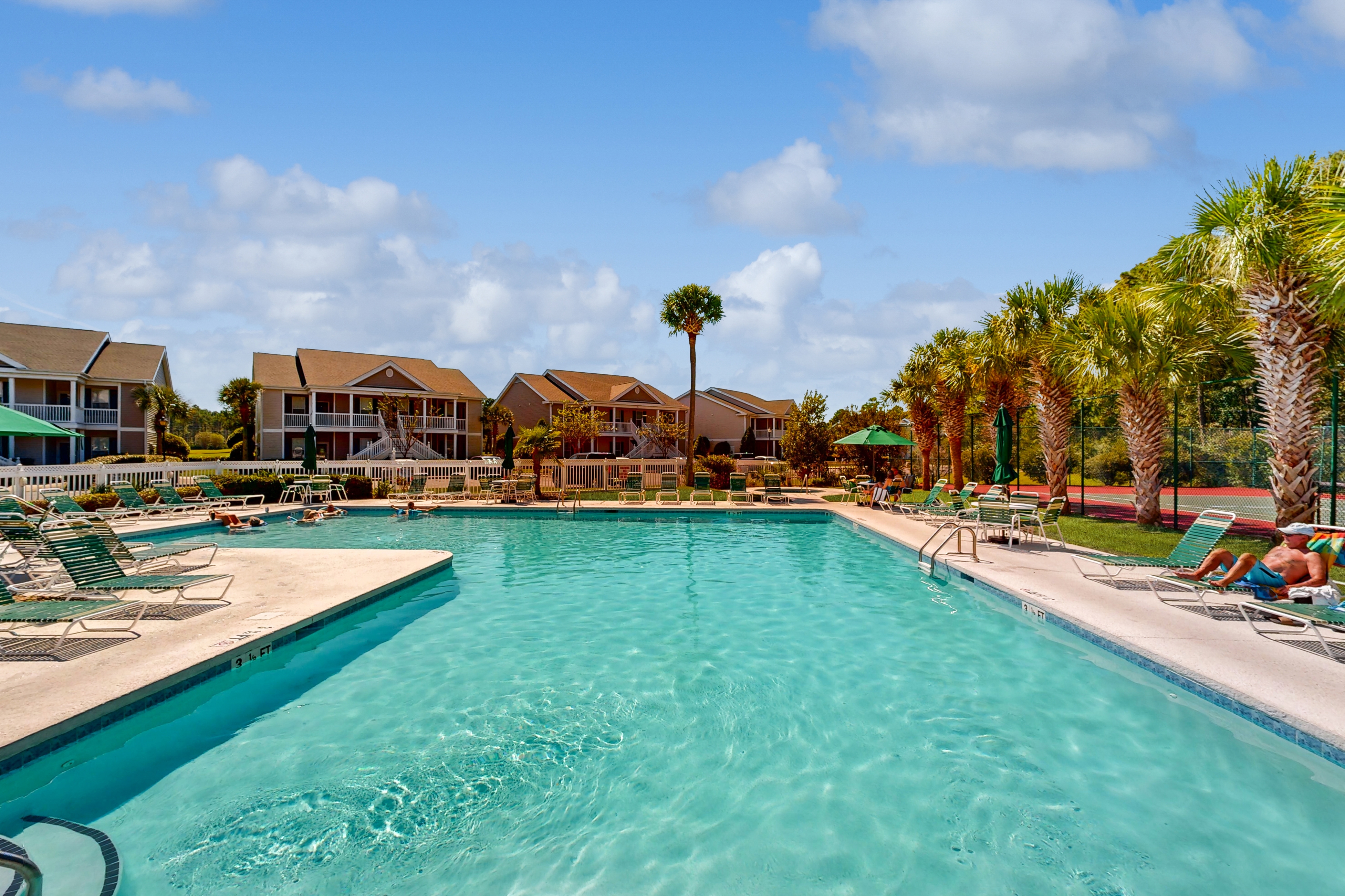 Beautiful dog-friendly coastal home close to beach, AC, and shared pool.