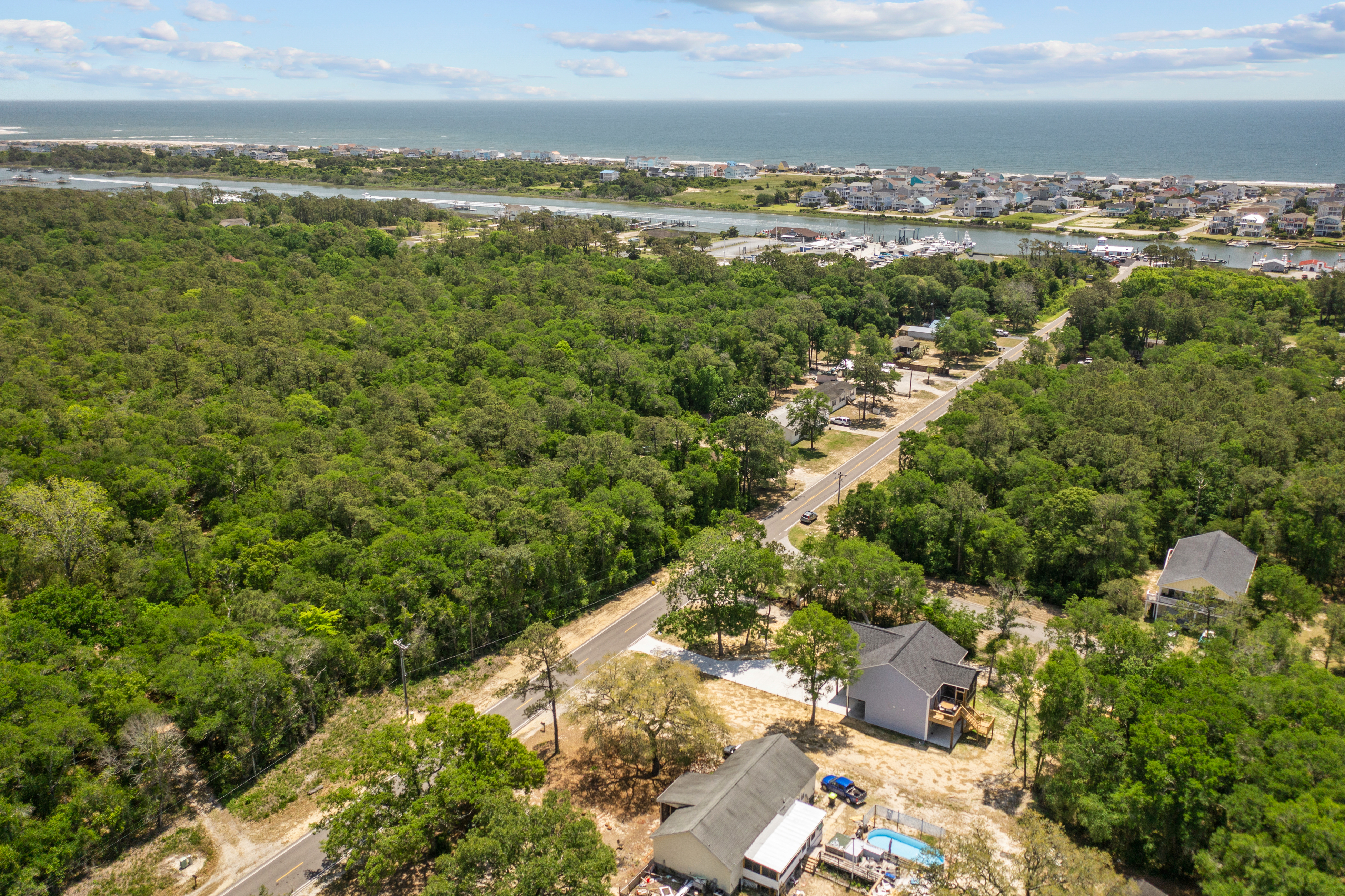 Lower-level home with patio, grill, outdoor shower, streaming, central AC