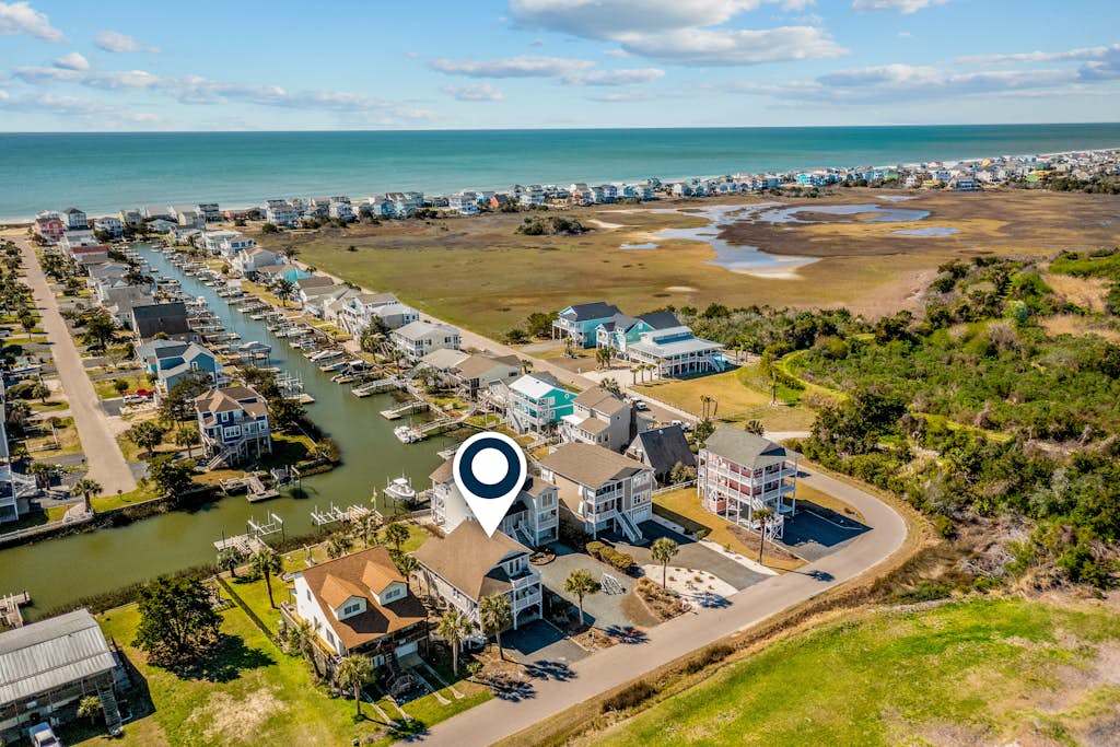 Waterway front home w/ private pool, fenced yard, boat dock, short walk to beach