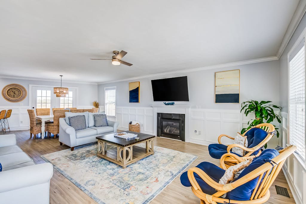 Designer, second-row home with elevator, marsh views, 2 living rooms & W/D