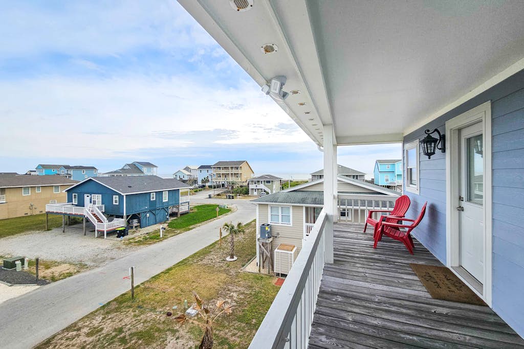 Canal-front, dog-friendly home with beach views, dock, balconies & beach access