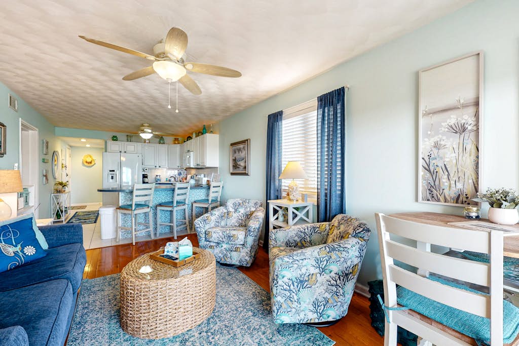 Condo near the beach with pool, BBQ area, balcony, & fireplace
