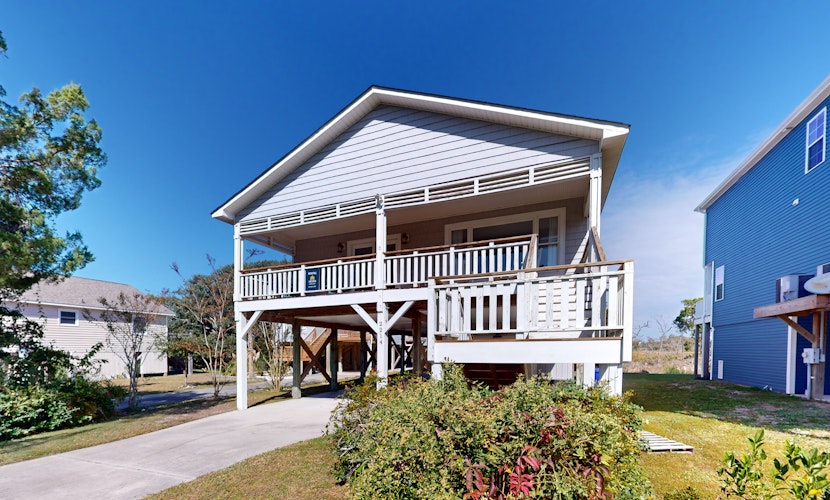 Walk to Beach | Marsh-View Escape with Screened Porch & Outdoor Shower