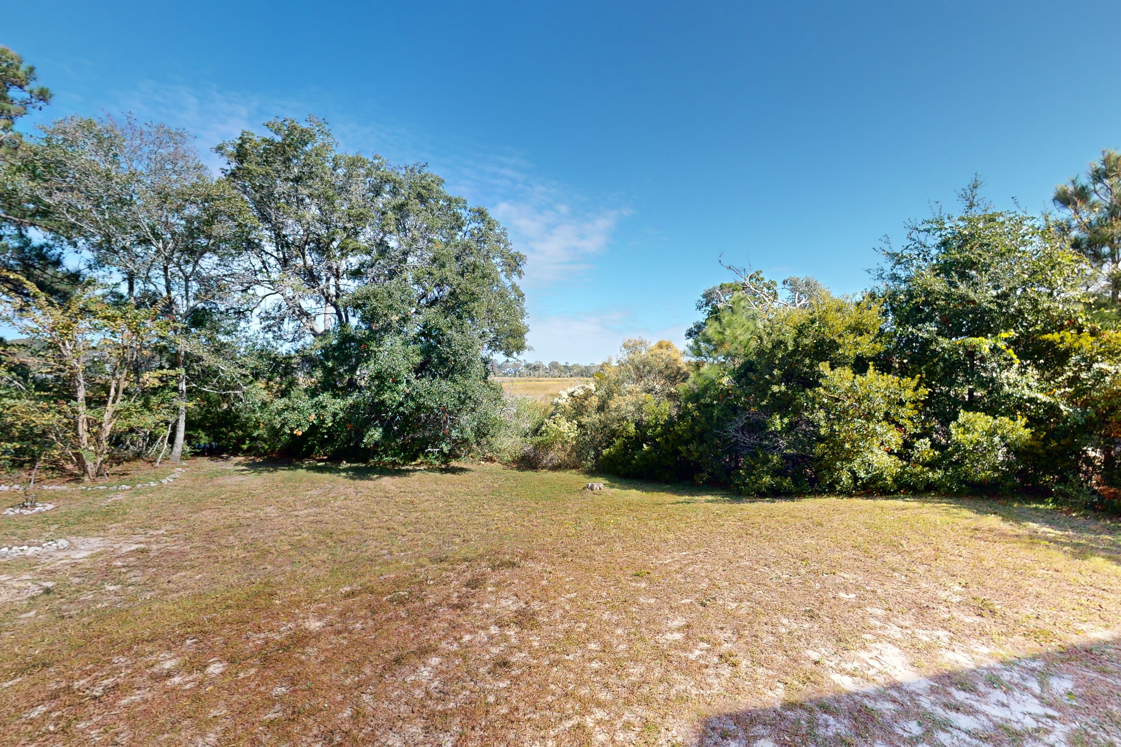 Walk to Beach | Marsh-View Escape with Screened Porch & Outdoor Shower