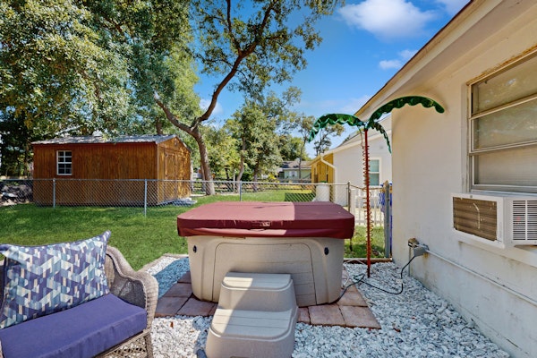 Dog-friendly coastal home with enclosed yard, private hot tub and fire-pit