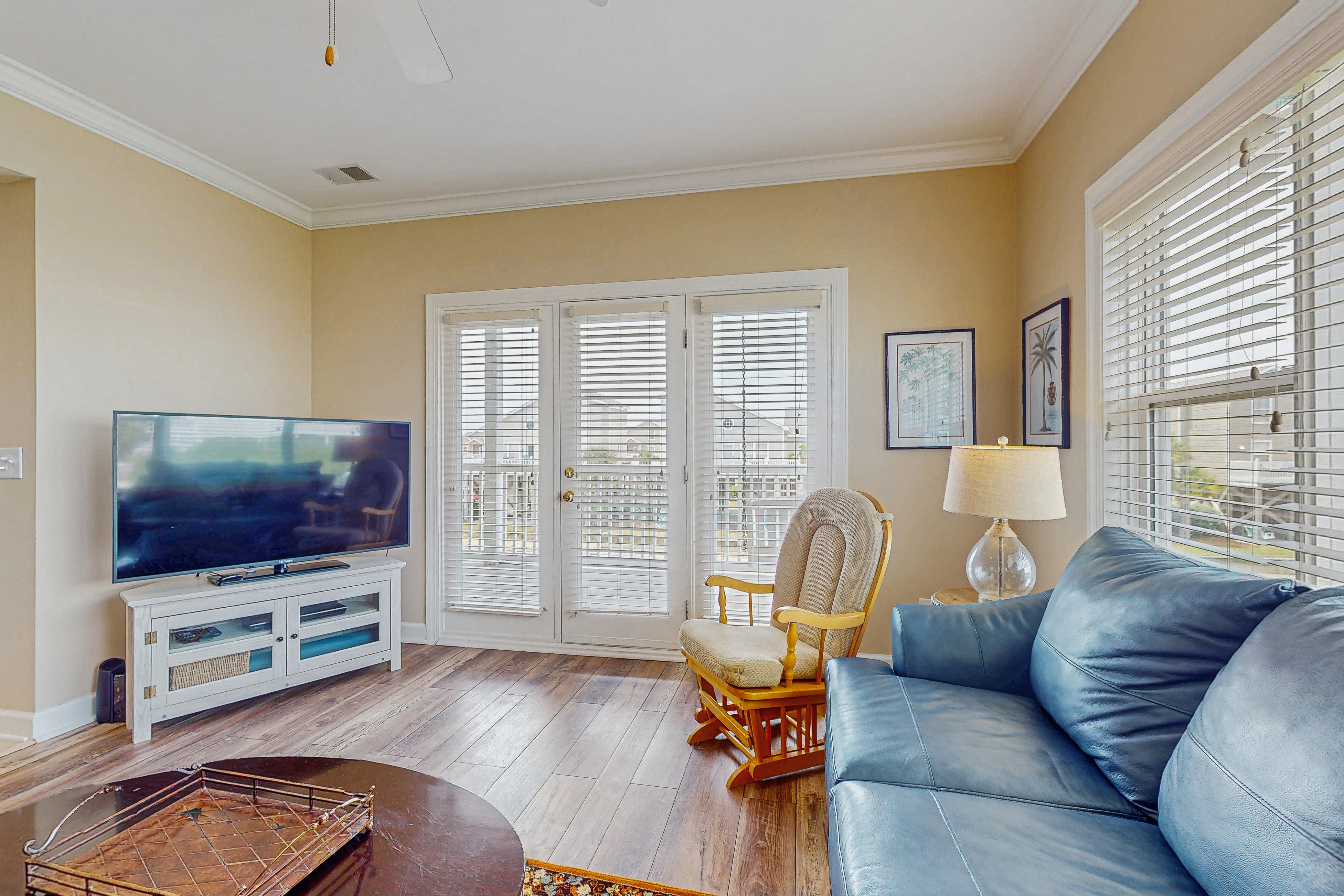 All-suite condo with private balcony &  pond views - walk to beach