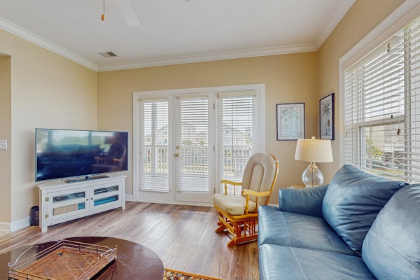 All-suite condo with private balcony & pond views - walk to beach