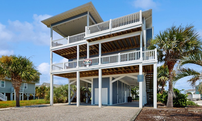 Stunning ocean-view home one block from beach & near golf courses