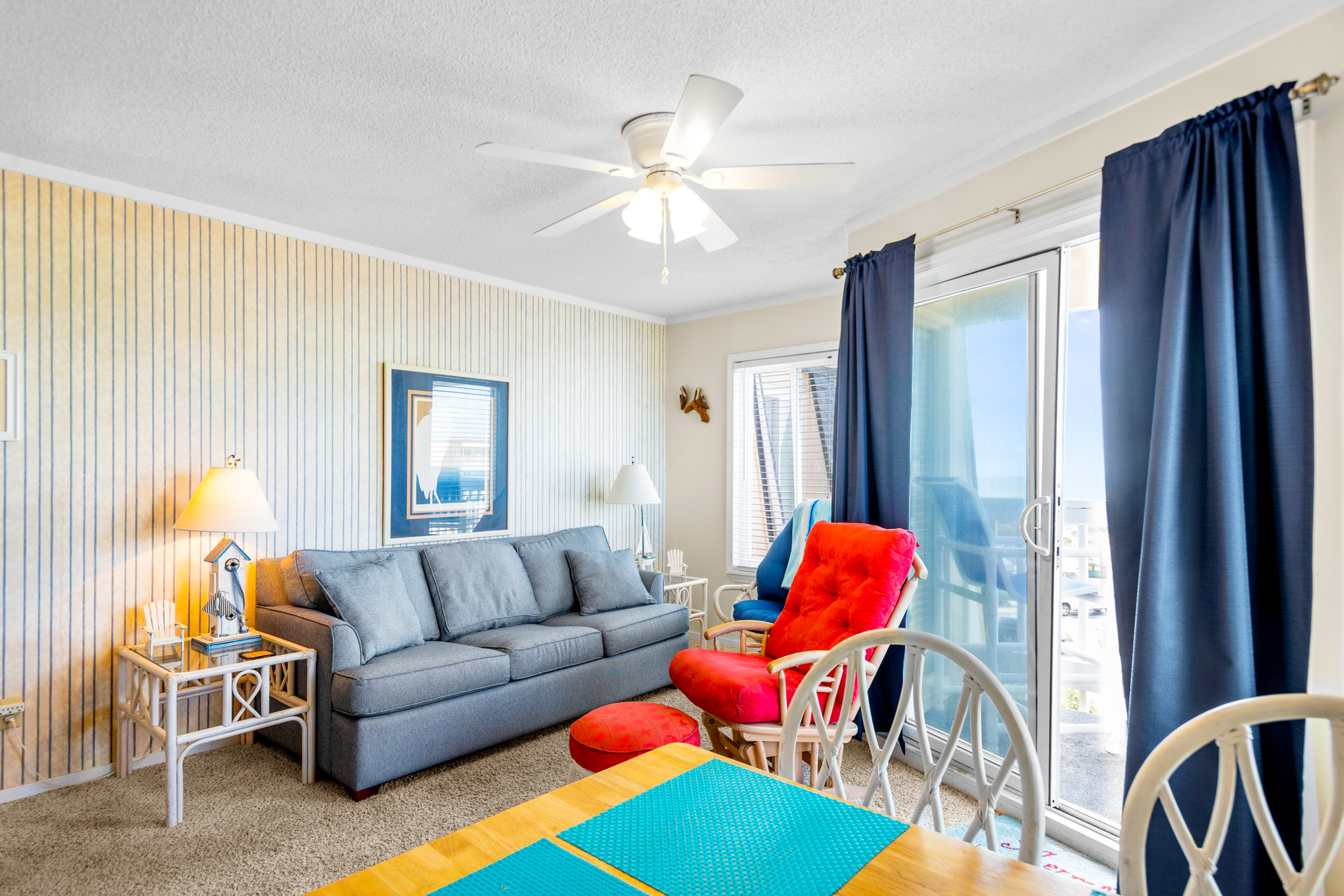 Ocean-view condo with beach access, pool, sports courts, & private balcony