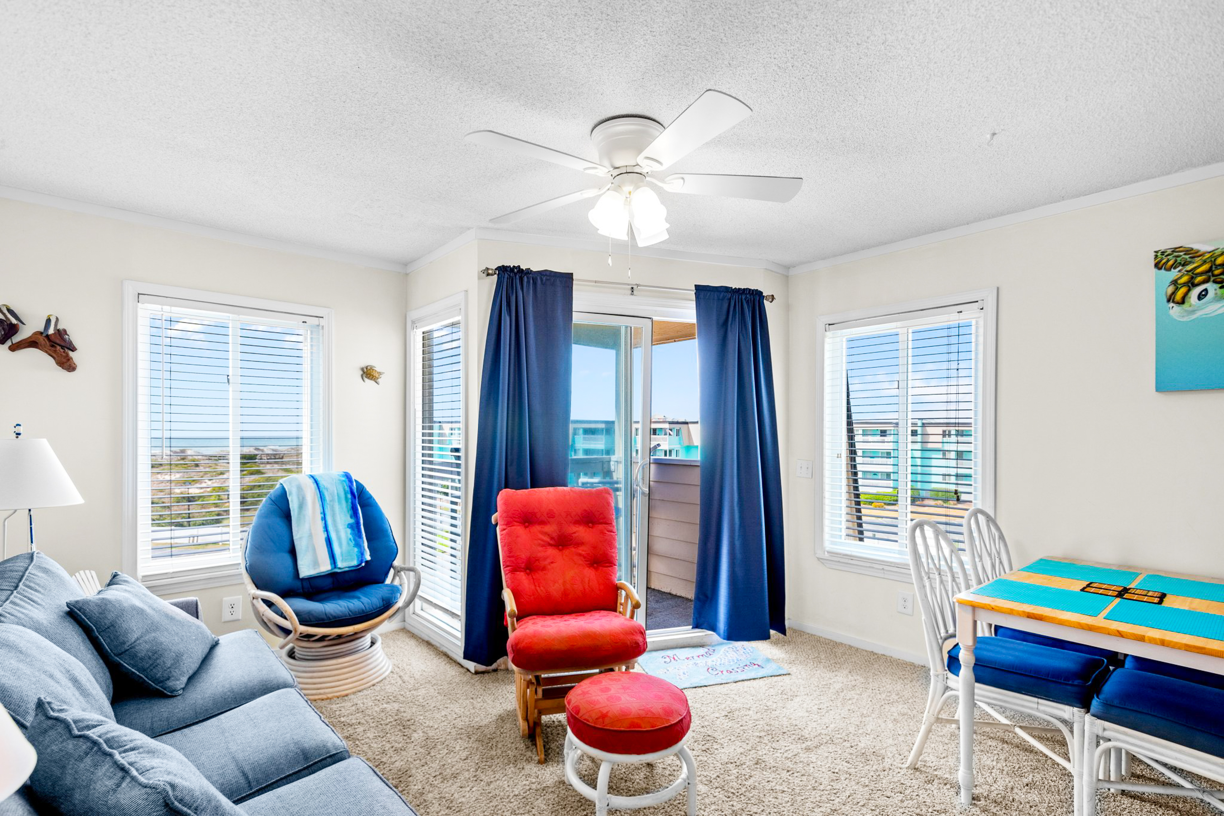 Ocean-view condo with beach access, pool, sports courts, & private balcony